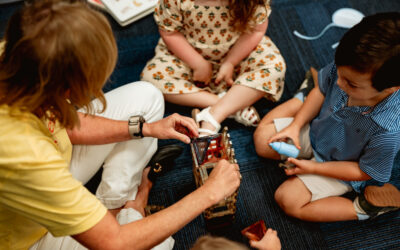 three_people_sitting_in_a_group